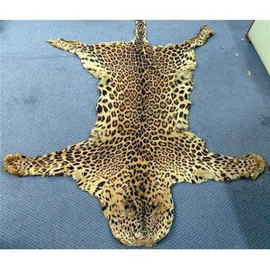 Early twentieth century leopard skin rug with felt backing