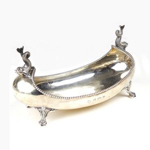 An Edwardian boat shaped bonbonniere with dolphin handles to…