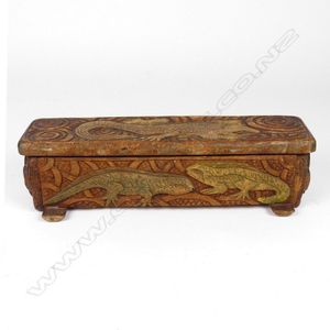 A Jane Brenkley carved wood 'wakahuia', the hinged lid and…