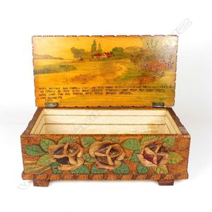 A Jane Brenkley carved wood 'Friendship' box, the hinged lid…