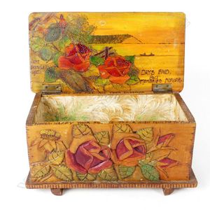 A Jane Brenkley carved wood 'Friendship' box, the hinged lid…