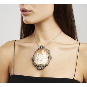 An antique cameo pendant, of Art Nouveau design, the large…