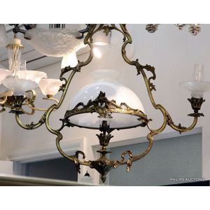 A rococo style cast bronze and opaline glass chandelier, 19th…