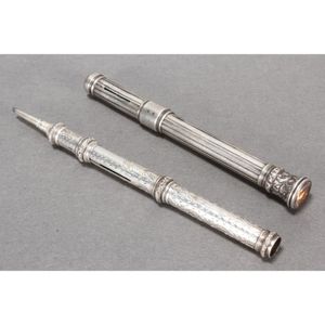 Two Victorian sterling silver propelling pencils, set with seal…