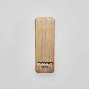 A Lancel Paris gold plated lighter. Oblong octagonal shape,…