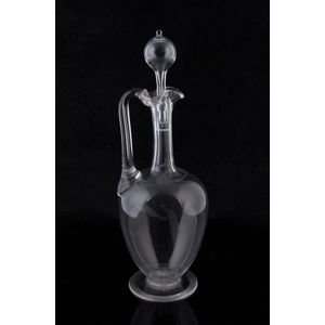 An antique English glass claret jug with stopper, circa 1860,…
