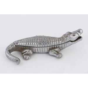 An antique cigarette box in the form of a crocodile, cast metal…