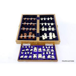 Two miniature vintage ivory chess sets, mid 20th century,…