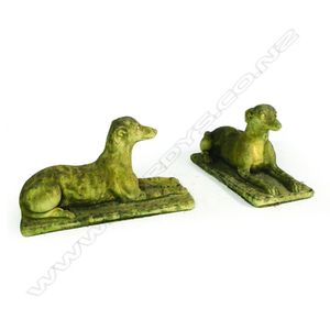A pair of church stone greyhounds, in crouching position, on…