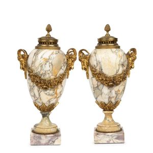 A pair of large gilt bronze mounted classical marble urns,…