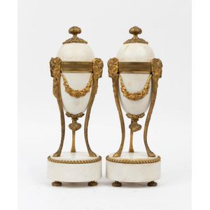 A pair of gilt bronze mounted white marble urns, French, 19th…