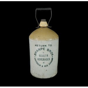 Sharpe Bros stoneware demijohn. With a carved wooden stopper.…