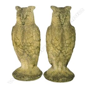 A pair of classical Church Stone owl garden ornaments, standing…