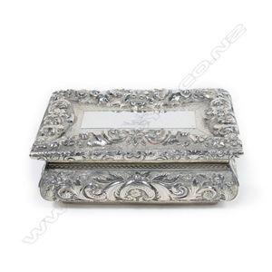 An early Victorian silver table snuff, casket shape with…