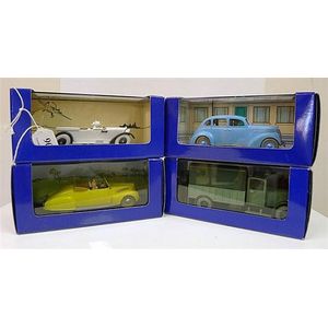 Four En Voiture Tintin figures from Tintin Comics Released in…