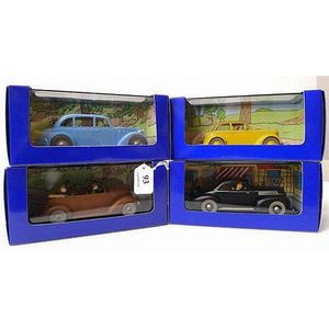 Four En Voiture Tintin figures from Tintin Comics Released in…
