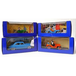 Four En Voiture Tintin figures from Tintin Comics Released in…
