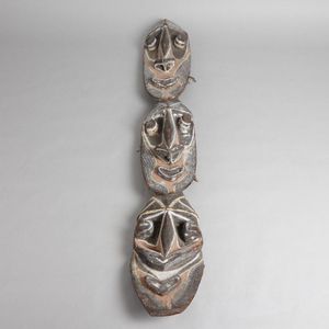 An impressive Sepik Triple-Visage sculpture. Long wooden…