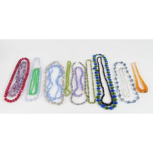 A large box of costume jewellery including crystal necklaces.