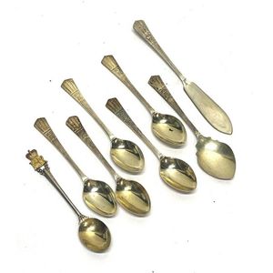 A collection of Queen Elizabeth II silver plate teaspoons and a…
