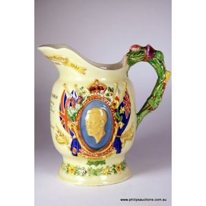 An interesting Crown Devon musical jug commemorating the…