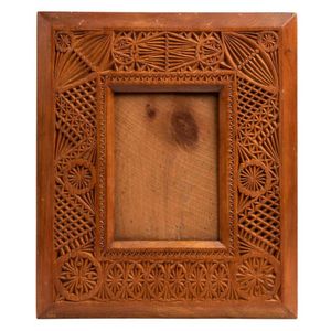 An Australian chip carved kauri pine picture frame, 19th…