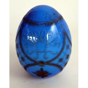 A Russian Faberge Sky blue glass etched egg, engraved with gilt…