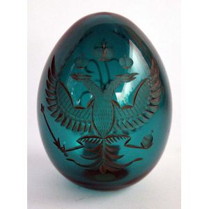 A Russian Faberge emerald glass etched egg, with gold Imperial…