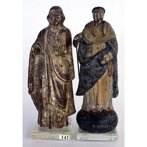A pair of 17th century figures, of the Virgin Mary and St.…