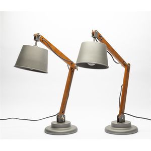 A pair of modern angle-poise bedside lamps in timber with metal…
