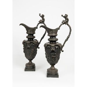 A pair of 19th century classical bronze ewers, 63 cm high
