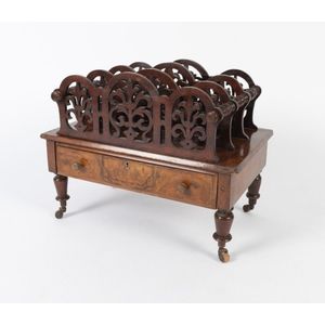 An antique English walnut music canterbury with single drawer…