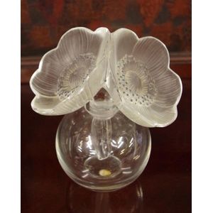 Lalique two anemones scent bottle, rim chipped, 15 cm high…