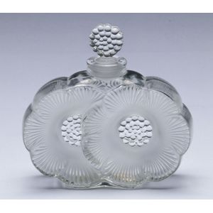 A Lalique crystal perfume bottle, height 10 cm, width 10 cm