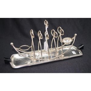 An English 20th century silver-plated toast rack, marked WH. - Bukowskis