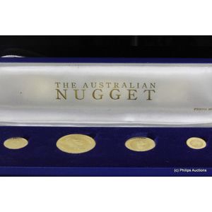 An Australian 1987 boxed nugget coin set, 24ct yellow gold,…
