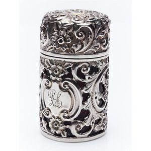 A silver cased ruby glass perfume bottle with hinged lid,&hellip;