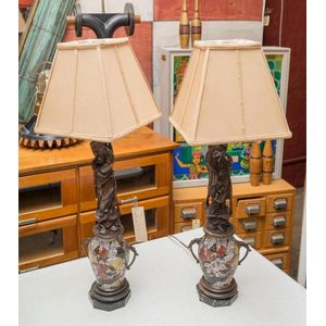 A pair of decorative Oriental bedside lamps, carved oriental…