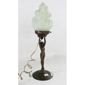 An Art Deco style Diana table lamp with shade, shaped as a…
