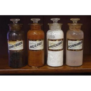 Four antique Apothecary / Pharmaceutical bottles, 20.5 cm high…