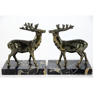 A pair of Art Deco spelter stag book ends, circa 1920s, a pair…