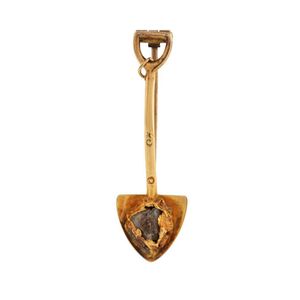 A gold miner's brooch in the form of a shovel with quartz ore&hellip;