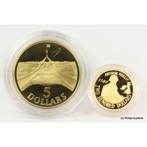 An Australian $200 gold proof coin dated 1987 & $5 proof coin,…
