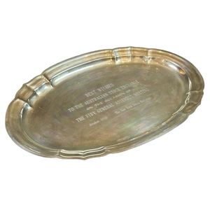 A large sterling silver salver. With an oval shape and…