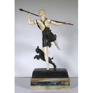 Joe Descomps Art Deco ivory and bronze dancing lady holding a…