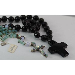 Facetted onyx necklace with cross, with another marked Une…