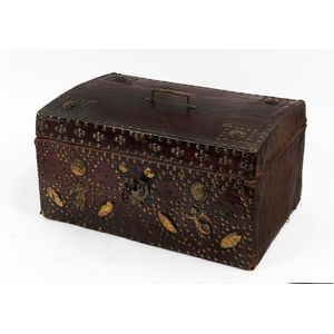 A small leather bound and studded jewel casket, French, 21 cm…