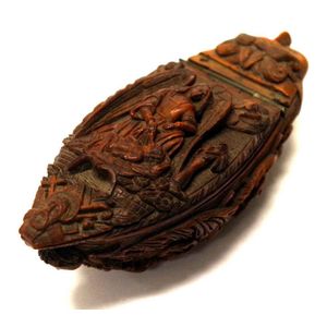 19th century carved Coquilla nut snuff box the hinged cover…