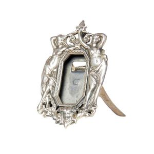 A miniature silver photograph frame, the rectangular aperture…