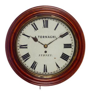 A circular wall clock by a. Tornaghi, Sydney, white painted…